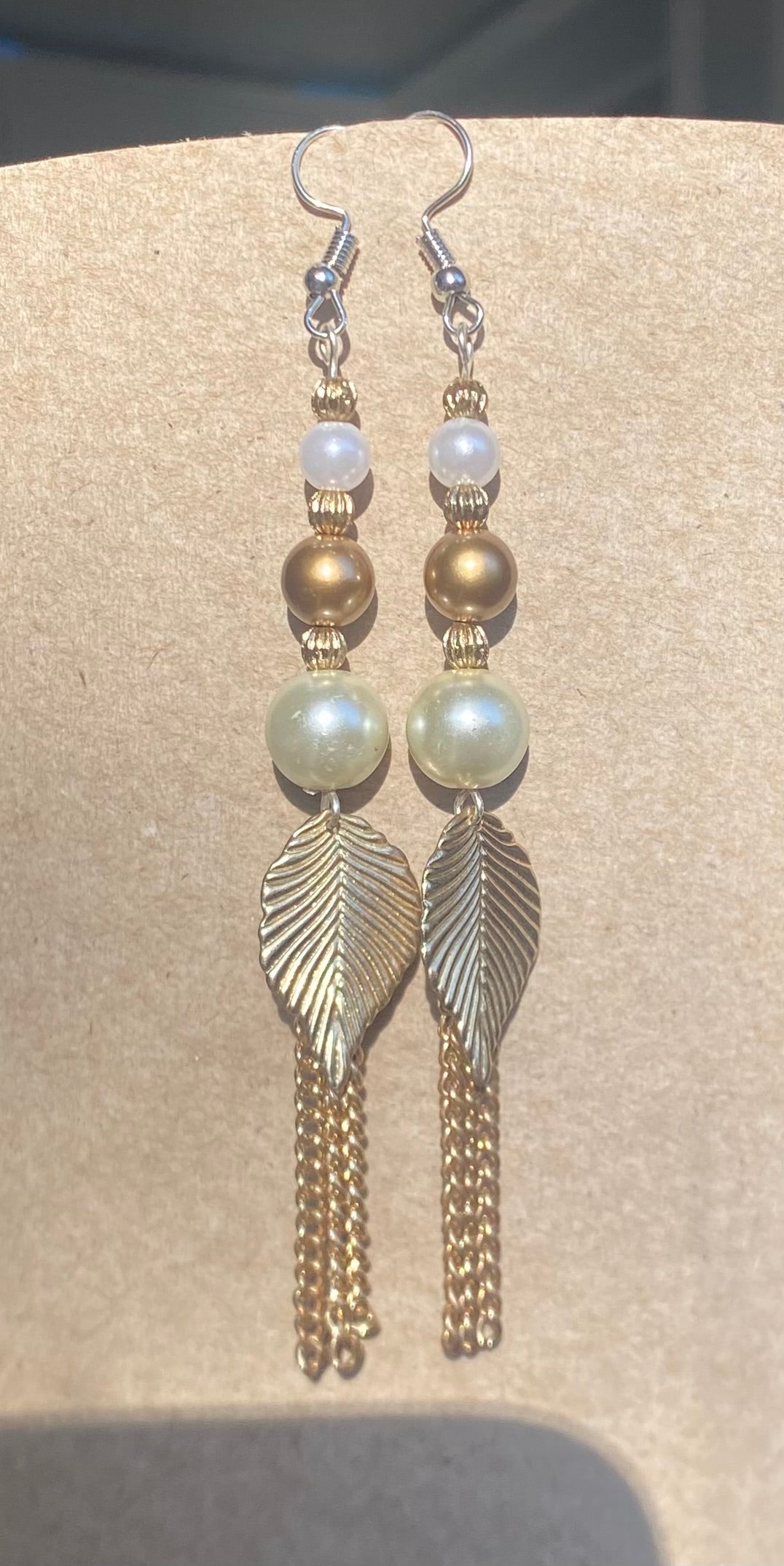 Gold and White Feather Earrings